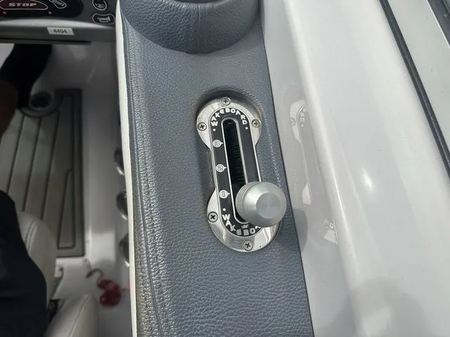 Slide: The Image of 2007 Nautique Super Air Nautique 210 wakeboard control lever on boat dashboard. - 14