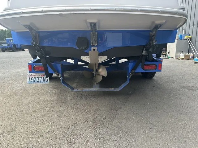 Slide: The Image of Rear view of a 2007 Nautique Super Air Nautique 210 boat on a trailer. - 6