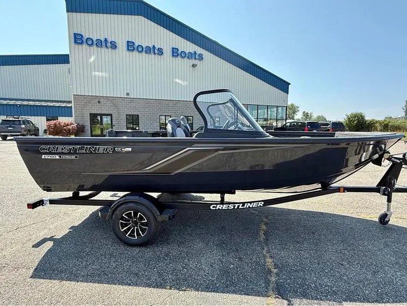 The Image of 2026 Crestliner 1750 Fish Hawk WT JS boat on trailer outside dealership. - 0