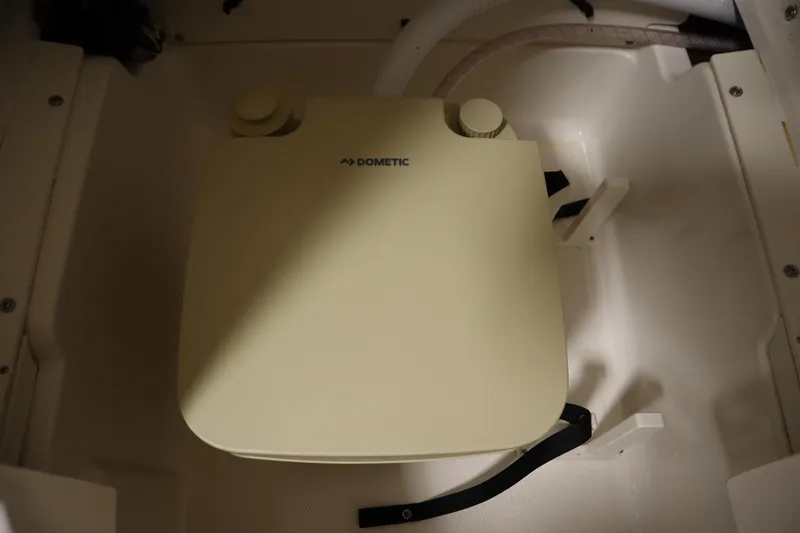 Slide: The Image of Dometic unit in 2022 Robalo 246 Cayman boat interior. - 29