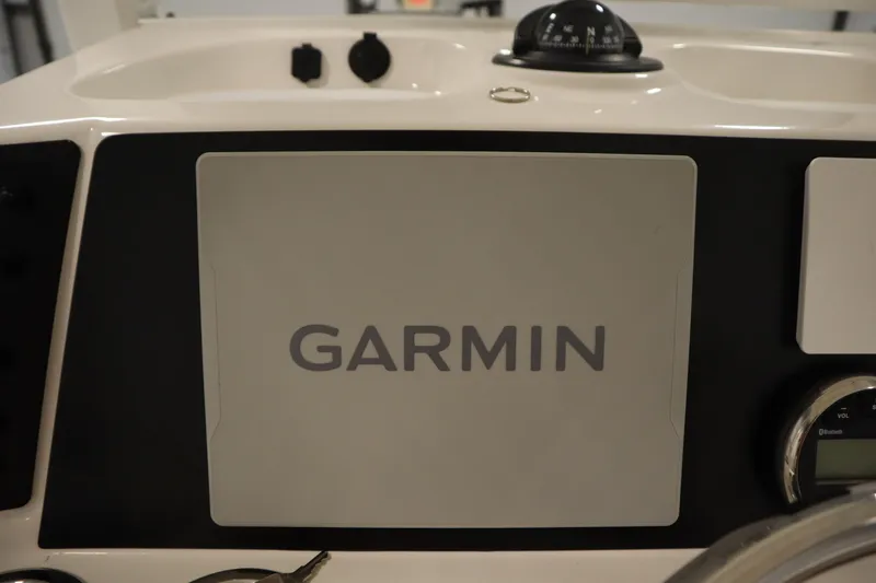 Slide: The Image of Garmin navigation system on 2022 Robalo 246 Cayman boat dashboard. - 39