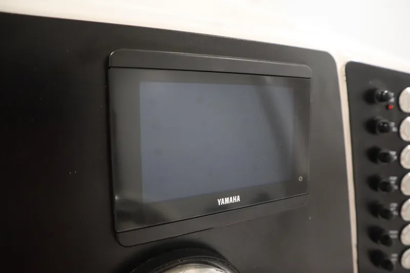 Slide: The Image of Yamaha display panel on 2022 Robalo 246 Cayman boat dashboard. - 42