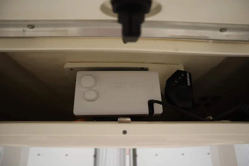 Slide: The Image of Simrad equipment installed on a 2022 Robalo 246 Cayman boat. - 49