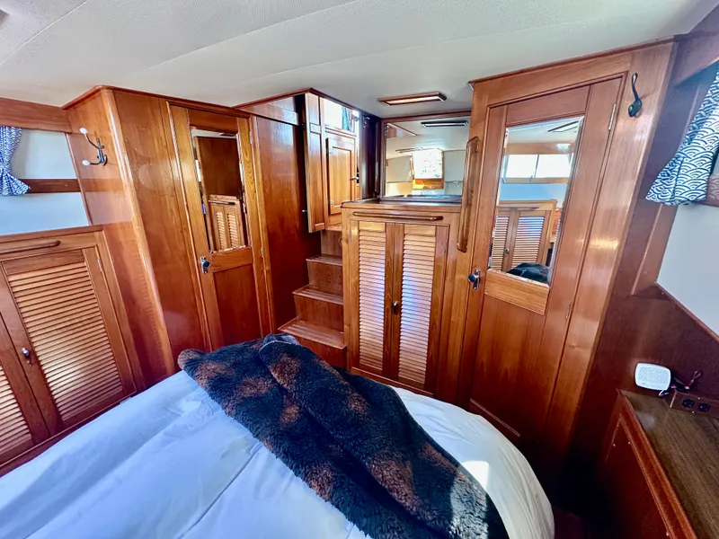 Slide: The Image of Luxurious wood interior of 1989 Grand Banks 42 Classic yacht cabin. - 41
