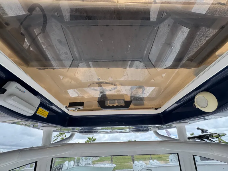 Slide: The Image of Interior view of 2020 Sportsman Open 282TE Center Console boat's roof with equipment. - 33