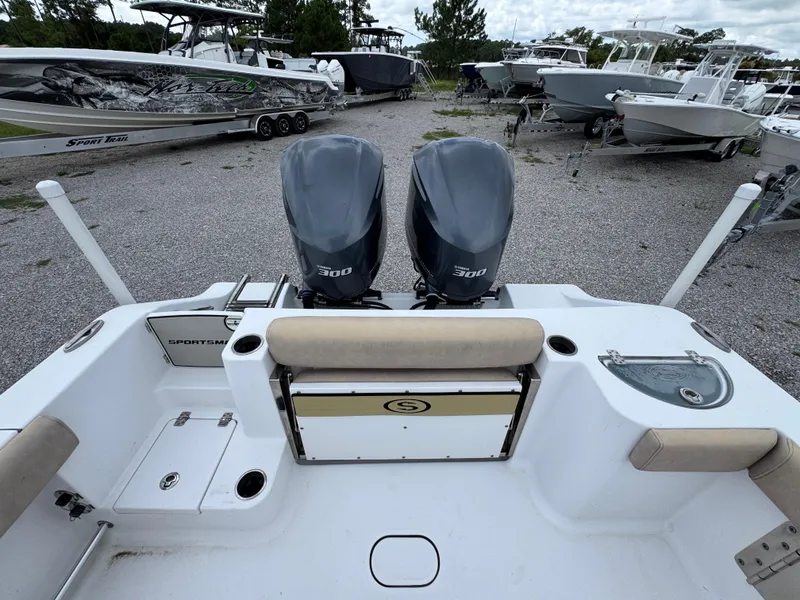 Slide: The Image of 2020 Sportsman Open 282TE Center Console with dual 300 engines in a boatyard. - 42