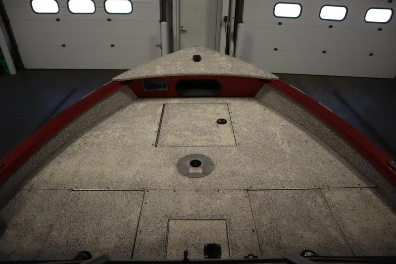 Slide: The Image of Interior view of 2023 Polar Kraft 2010 OUTLANDER DC boat, featuring spacious deck layout. - 11