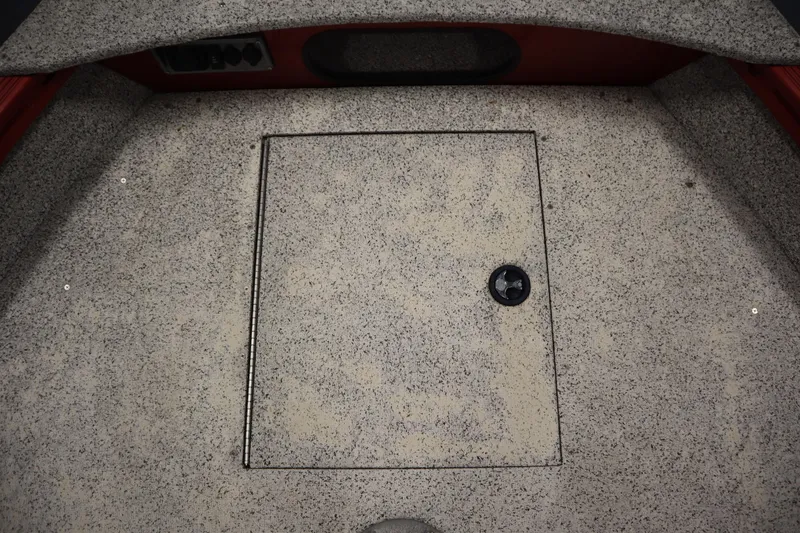 Slide: The Image of 2023 Polar Kraft 2010 OUTLANDER DC boat interior with storage compartment. - 14