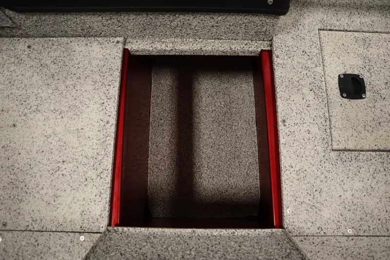 Slide: The Image of Open storage compartment on 2023 Polar Kraft 2010 OUTLANDER DC boat. - 21