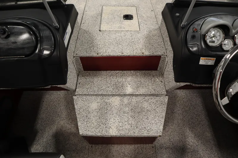 Slide: The Image of Interior view of 2023 Polar Kraft 2010 Outlander DC boat cockpit with dashboard and steps. - 25