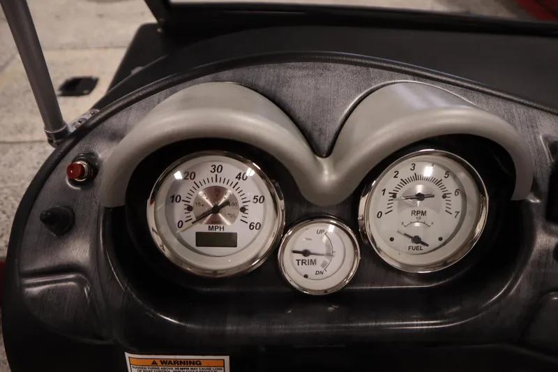 Slide: The Image of Dashboard of 2023 Polar Kraft 2010 Outlander DC with speedometer and fuel gauge. - 30