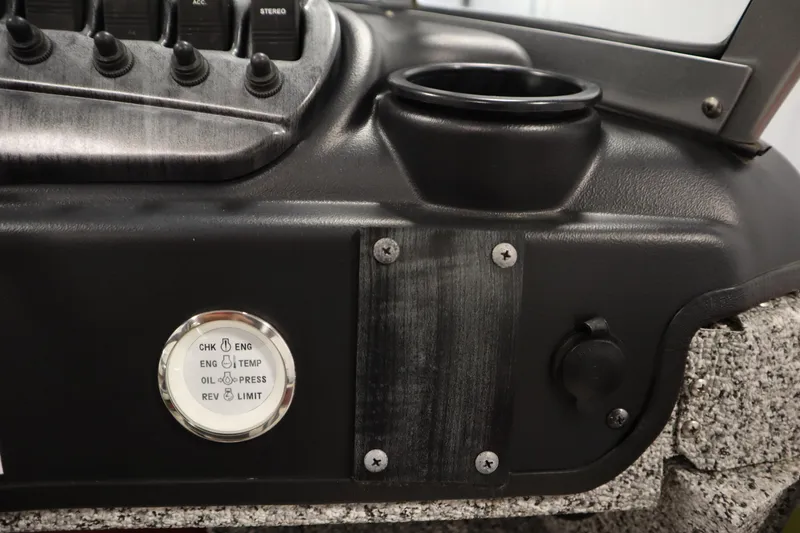 Slide: The Image of Control panel of 2023 Polar Kraft 2010 OUTLANDER DC boat with gauges and switches. - 32