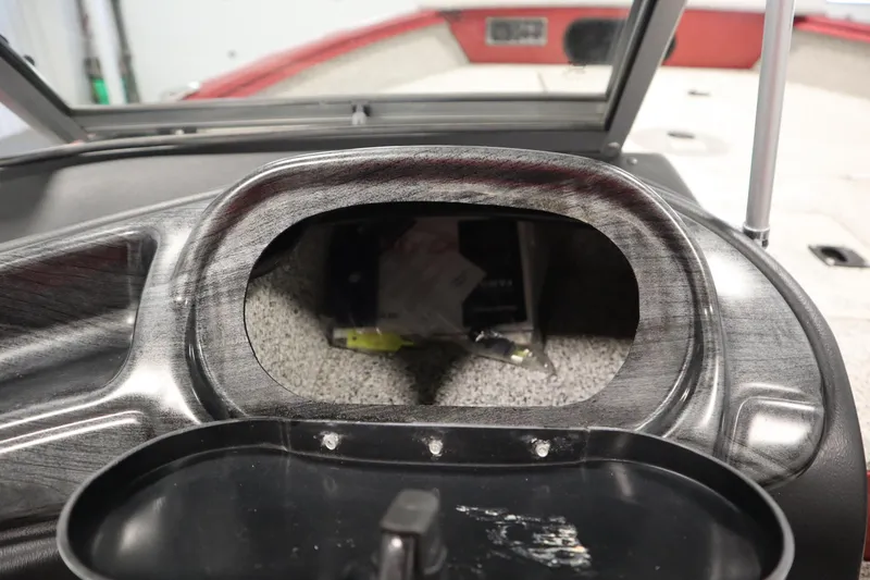 Slide: The Image of Dashboard storage compartment of 2023 Polar Kraft 2010 Outlander DC boat. - 38