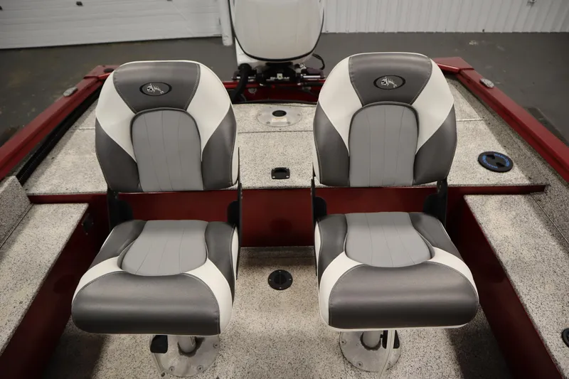 Slide: The Image of 2023 Polar Kraft 2010 Outlander DC boat seats, gray and white, in a red interior. - 46