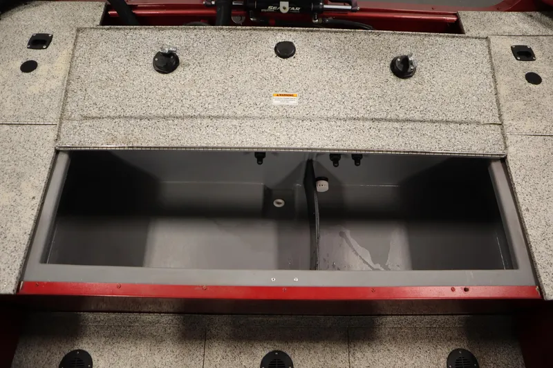 Slide: The Image of 2023 Polar Kraft Outlander DC boat storage compartment, open and empty. - 48