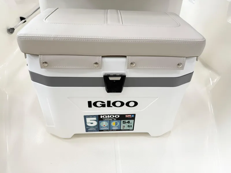 Slide: The Image of Igloo cooler with cushioned seat on 2025 Boston Whaler 150 Montauk boat. - 8