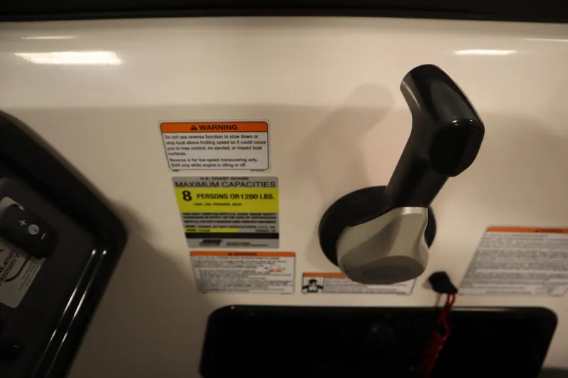 Slide: The Image of Yamaha Boats 2021 190 AR control panel with capacity warning label. - 23