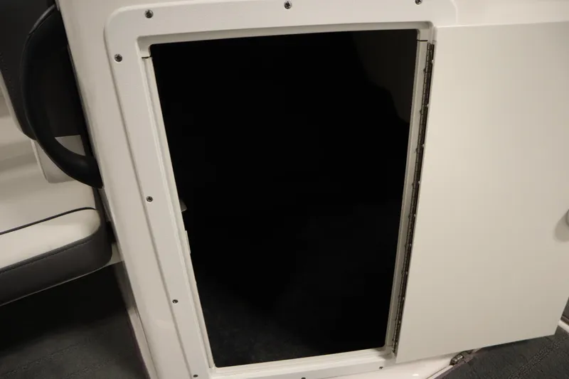 Slide: The Image of Open storage compartment on 2021 Yamaha Boats 190 AR. - 29