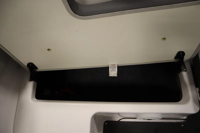 Slide: The Image of Open storage compartment in 2021 Yamaha Boats 190 AR. - 33