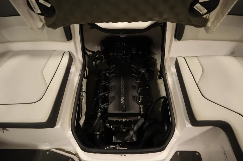 Slide: The Image of Engine compartment of 2021 Yamaha Boats 190 AR, showcasing a clean, organized layout. - 34