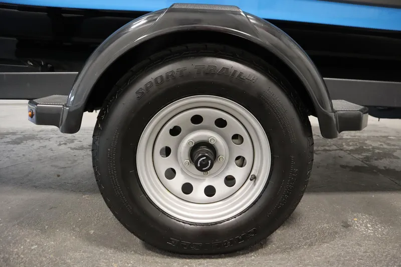 Slide: The Image of Trailer wheel of 2021 Yamaha Boats 190 AR, featuring Sport Trail tire. - 43