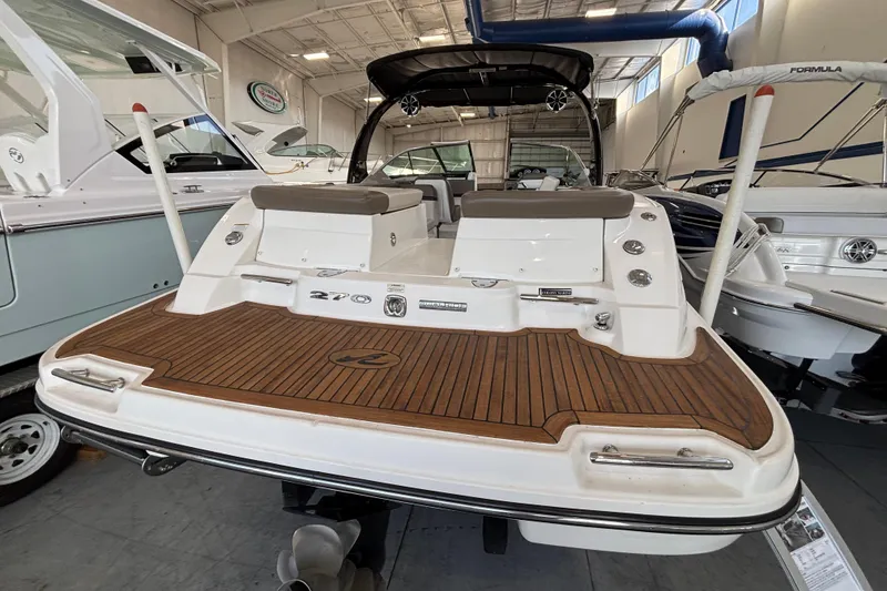 Slide: The Image of Luxurious seating area on a 2013 Sea Ray 270 SLX boat. - 13