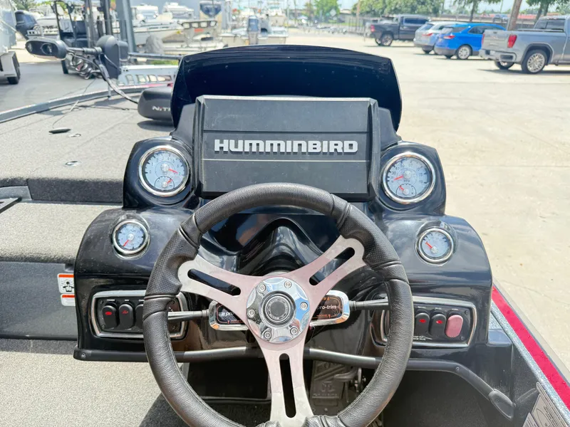 Slide: The Image of Steering console of a 2016 Nitro Z18 boat with Humminbird electronics. - 13