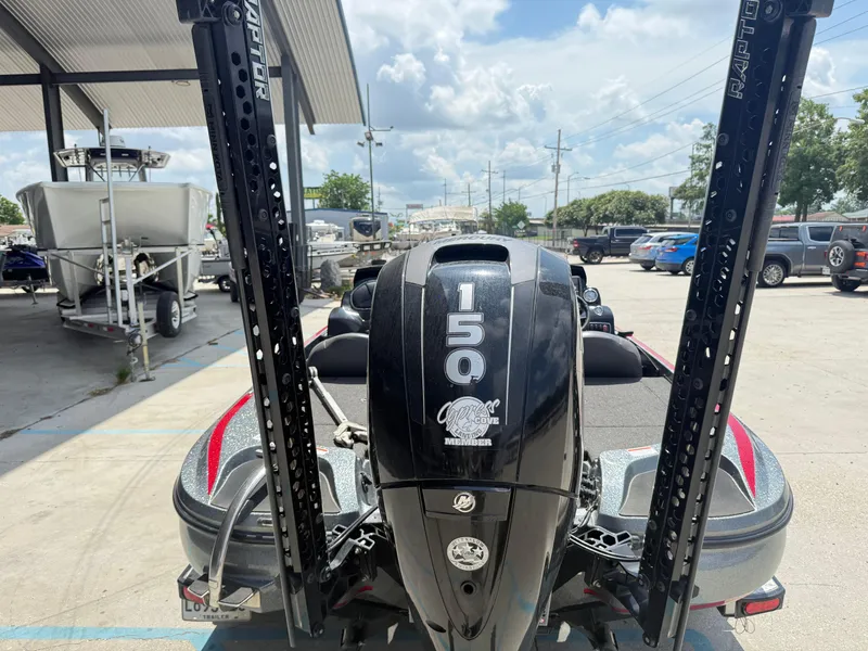 Slide: The Image of 2016 Nitro Z18 boat with 150 horsepower engine at a dealership. - 7