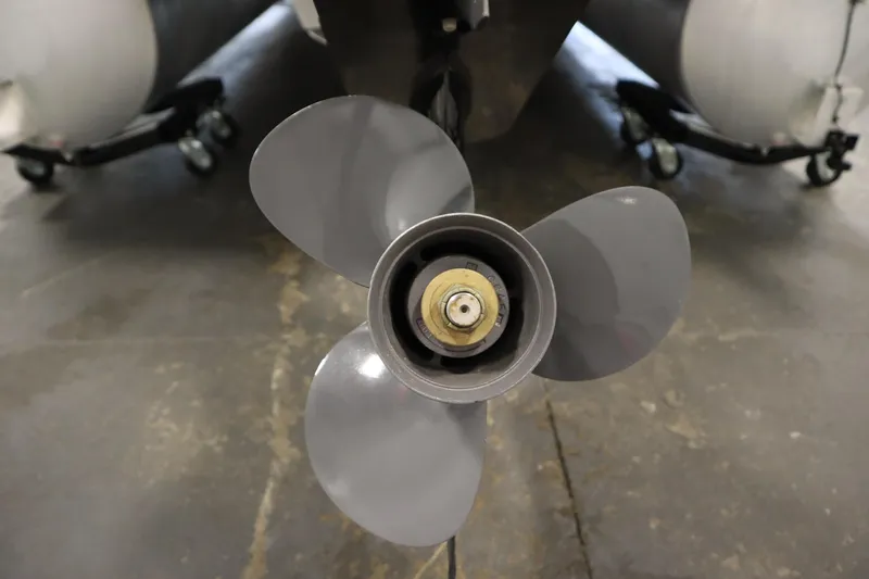 Slide: The Image of Propeller of 2022 Sylvan 21 L-1 CRS boat in a garage setting. - 33