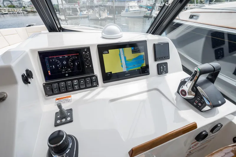 Slide: The Image of Helm of 2025 MJM 3 boat with advanced navigation and control systems. - 24