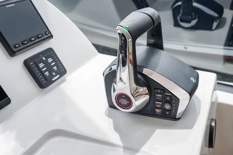 Slide: The Image of Control panel of 2025 MJM 3 boat with advanced throttle system. - 25