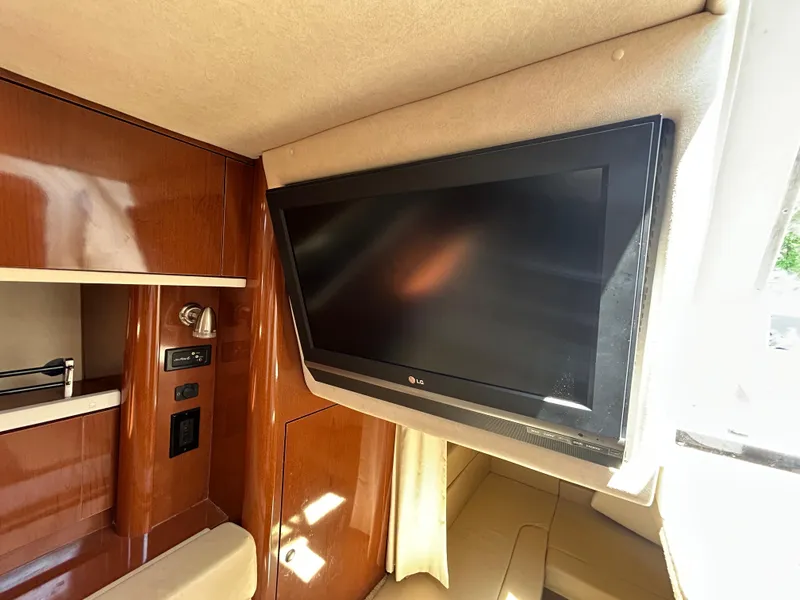 Slide: The Image of Interior of 2008 Sea Ray 330 Sundancer with wall-mounted LG TV. - 24