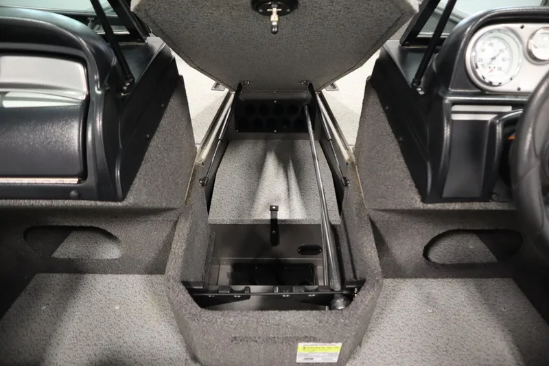 Slide: The Image of 2021 Lund 1675 Adventure WT boat interior with open storage compartment. - 20