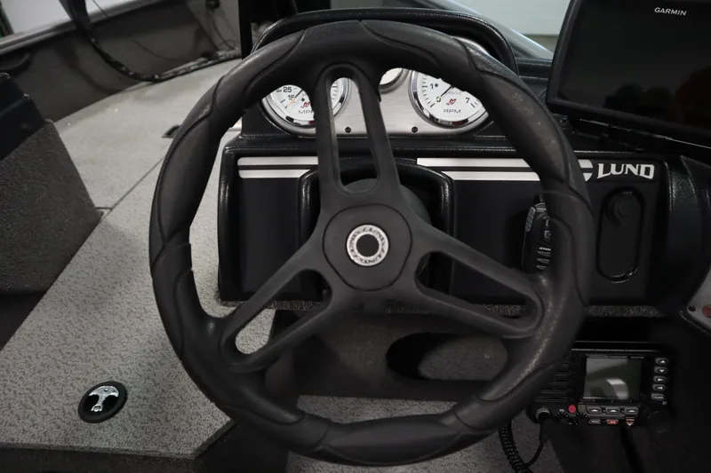 Slide: The Image of Steering wheel and dashboard of 2021 Lund 1675 Adventure WT boat. - 23