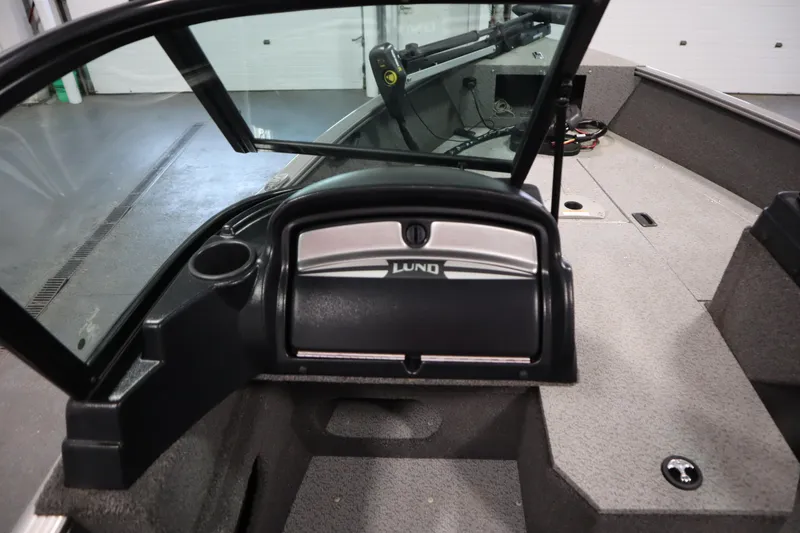 Slide: The Image of 2021 Lund 1675 ADVENTURE WT boat interior with windshield and dashboard. - 32