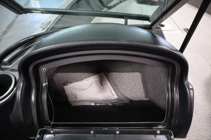 Slide: The Image of 2021 Lund 1675 ADVENTURE WT boat glove compartment with documents inside. - 33