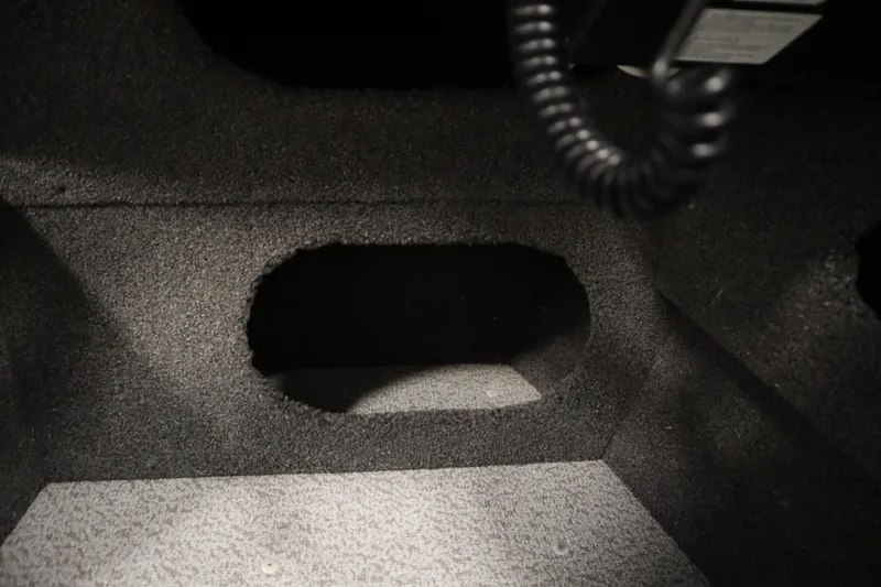 Slide: The Image of Interior compartment of 2021 Lund 1675 ADVENTURE WT boat, featuring carpeted storage space. - 35