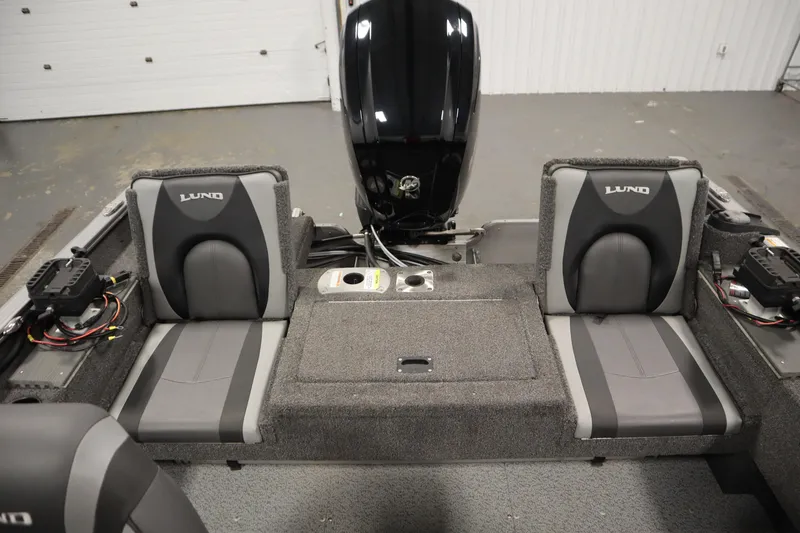 Slide: The Image of 2021 Lund 1675 ADVENTURE WT boat interior with dual seats and motor. - 38