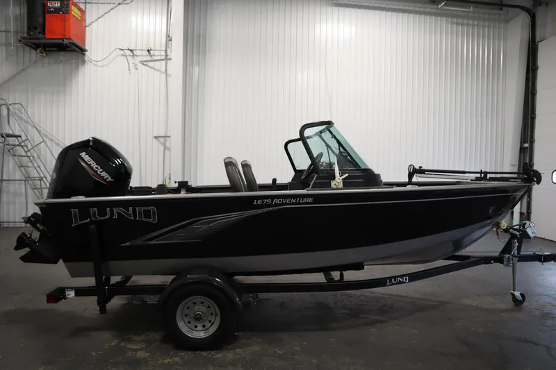 Slide: The Image of 2021 Lund 1675 Adventure WT boat on trailer in indoor setting. - 4