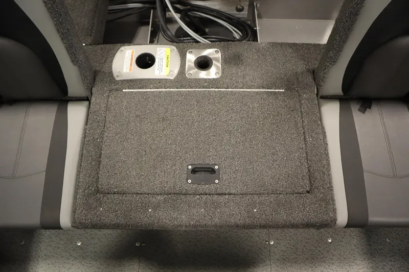 Slide: The Image of 2021 Lund 1675 Adventure WT boat interior with carpeted storage compartment. - 43