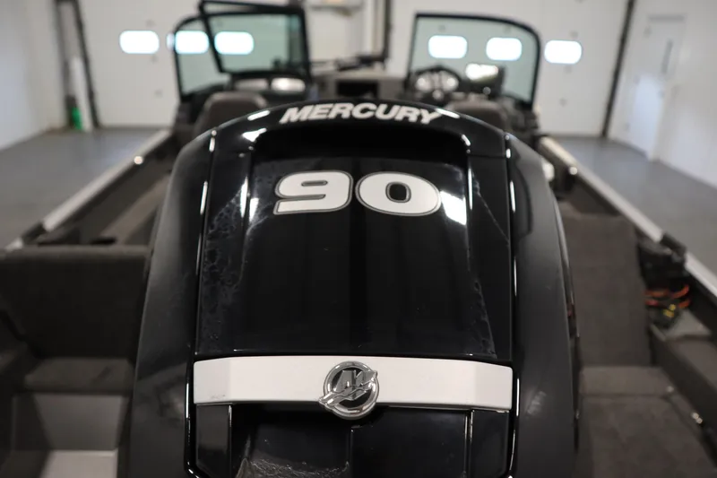 Slide: The Image of 2021 Lund 1675 ADVENTURE WT boat with Mercury 90 engine in a garage. - 49