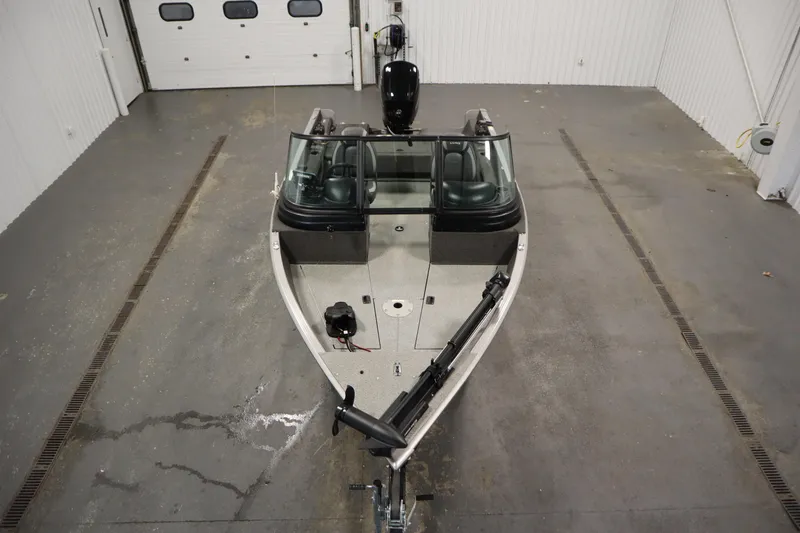 Slide: The Image of 2021 Lund 1675 ADVENTURE WT boat in a garage, top view. - 9