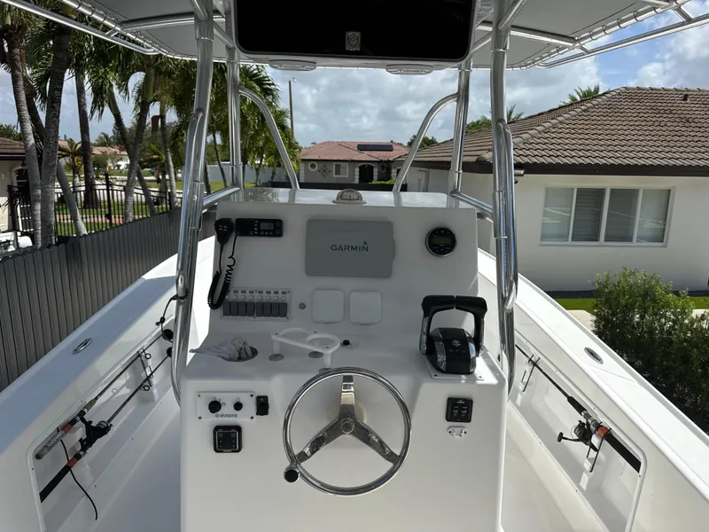 Slide: The Image of Center console of a 2015 Ocean Master 296 boat with Garmin navigation system. - 7