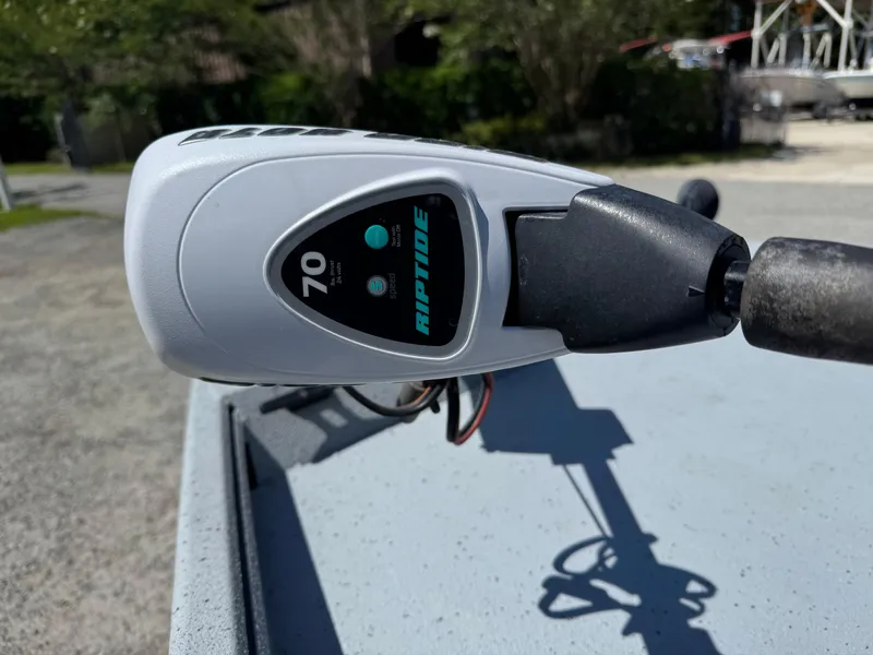 Slide: The Image of Trolling motor handle on a 2017 G3 20SC DLX boat, featuring Riptide 70 model. - 9