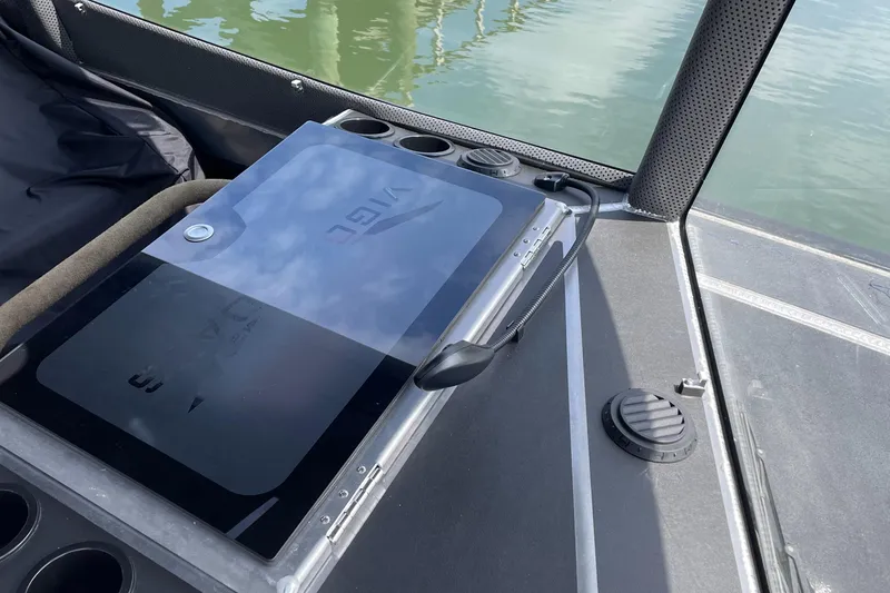 Slide: The Image of 2024 Viggo C10 control panel on a boat deck, near water. - 14