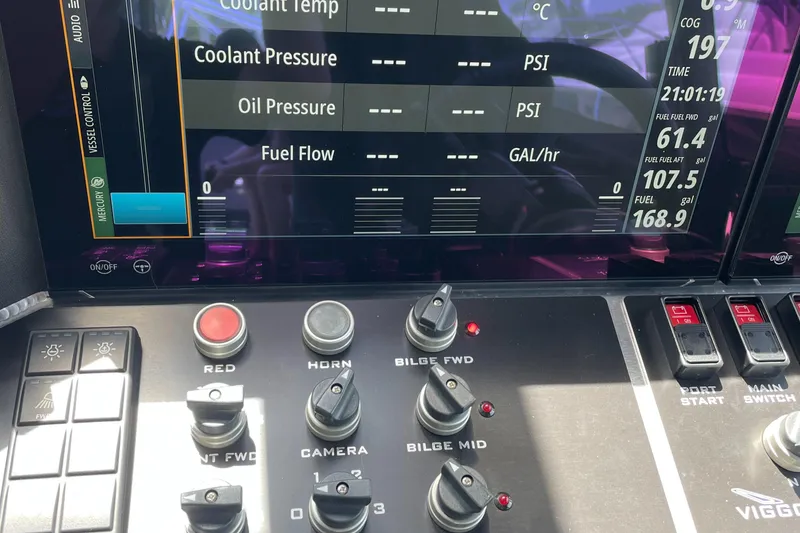 Slide: The Image of Control panel of a 2024 Viggo C10 boat with digital display and switches. - 4
