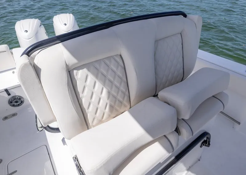 Slide: The Image of Luxurious seating on 2026 Sea Hunt Gamefish 27 boat, featuring quilted upholstery. - 12