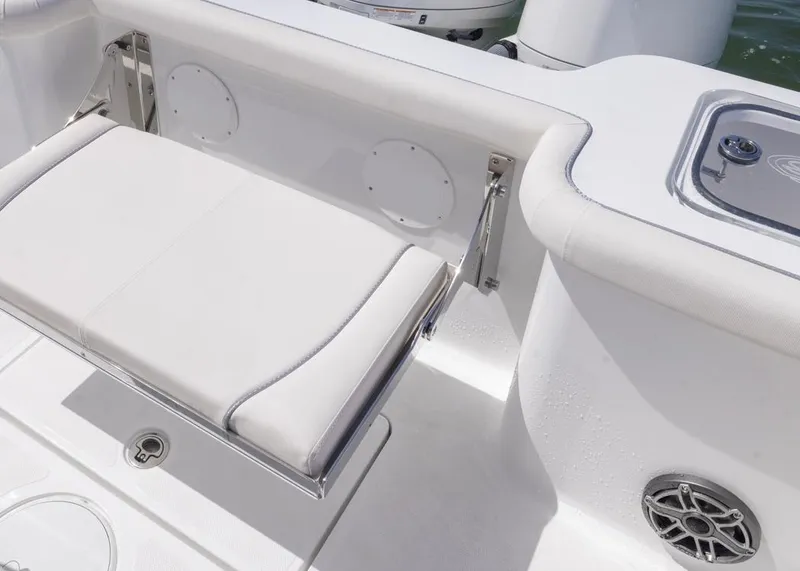 Slide: The Image of 2026 Sea Hunt Gamefish 27 Forward Seating, featuring a sleek white interior with foldable seating. - 15