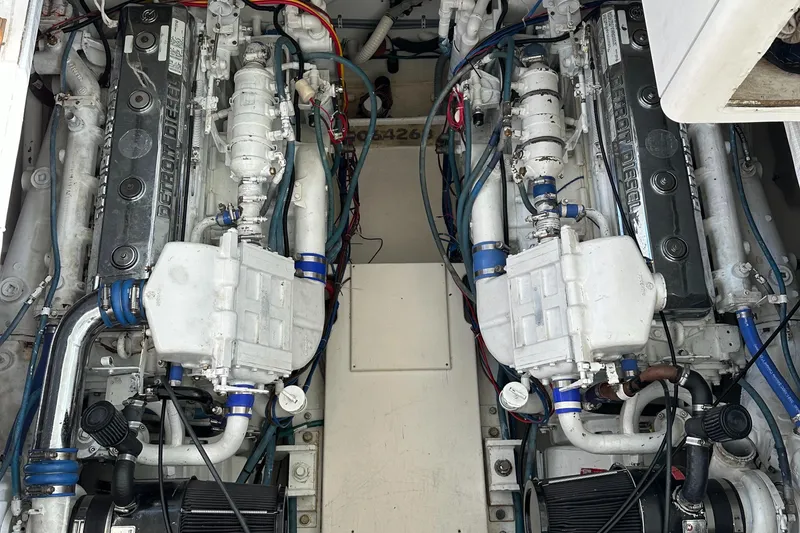 Slide: The Image of Engine room of a 1998 Hatteras 39 Sport Express with Detroit Diesel engines. - 21