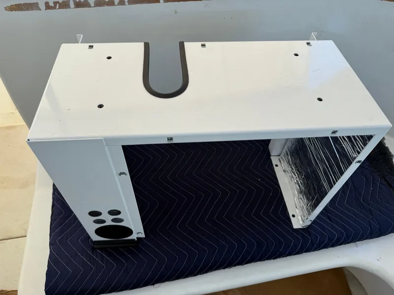 Slide: The Image of White component for 1998 Hatteras 39 Sport Express, placed on a dark padded surface. - 24